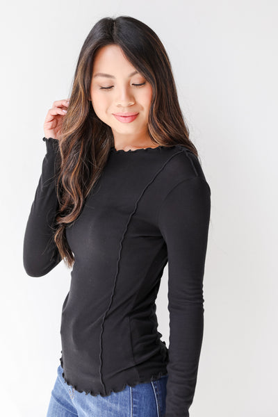 black exposed seam top side view