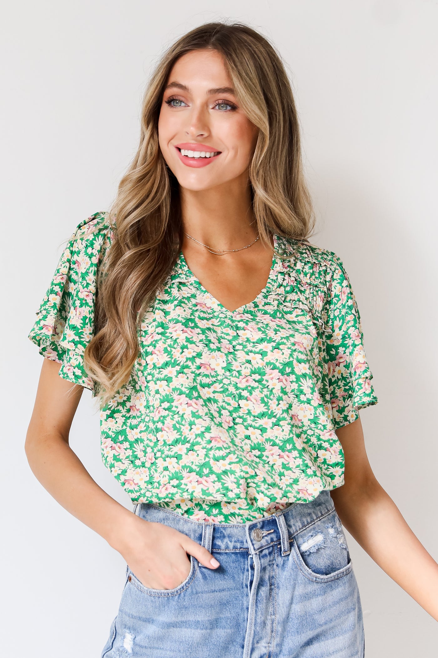 green Floral Blouse on model