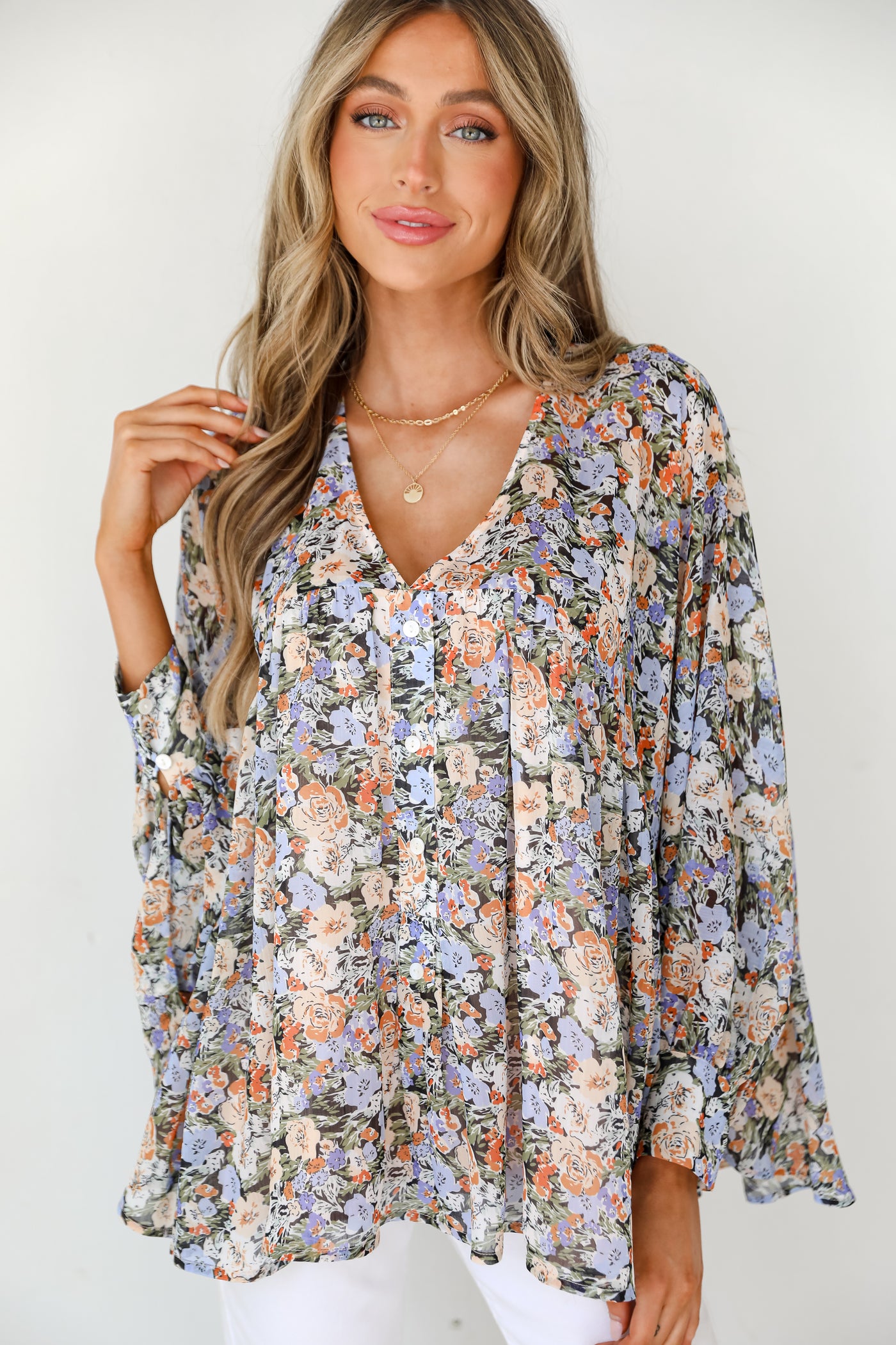 model wearing a Floral Blouse