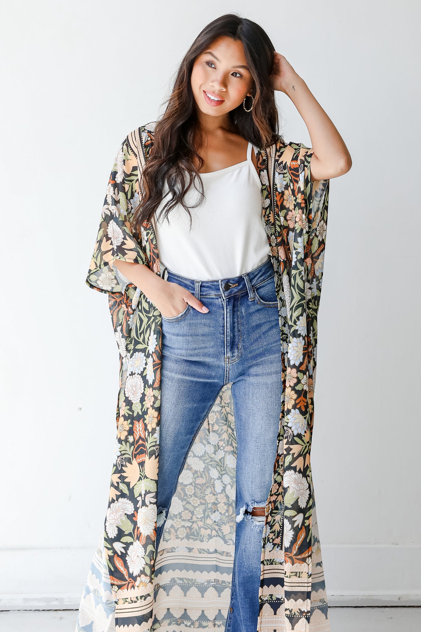 model wearing a floral kimono