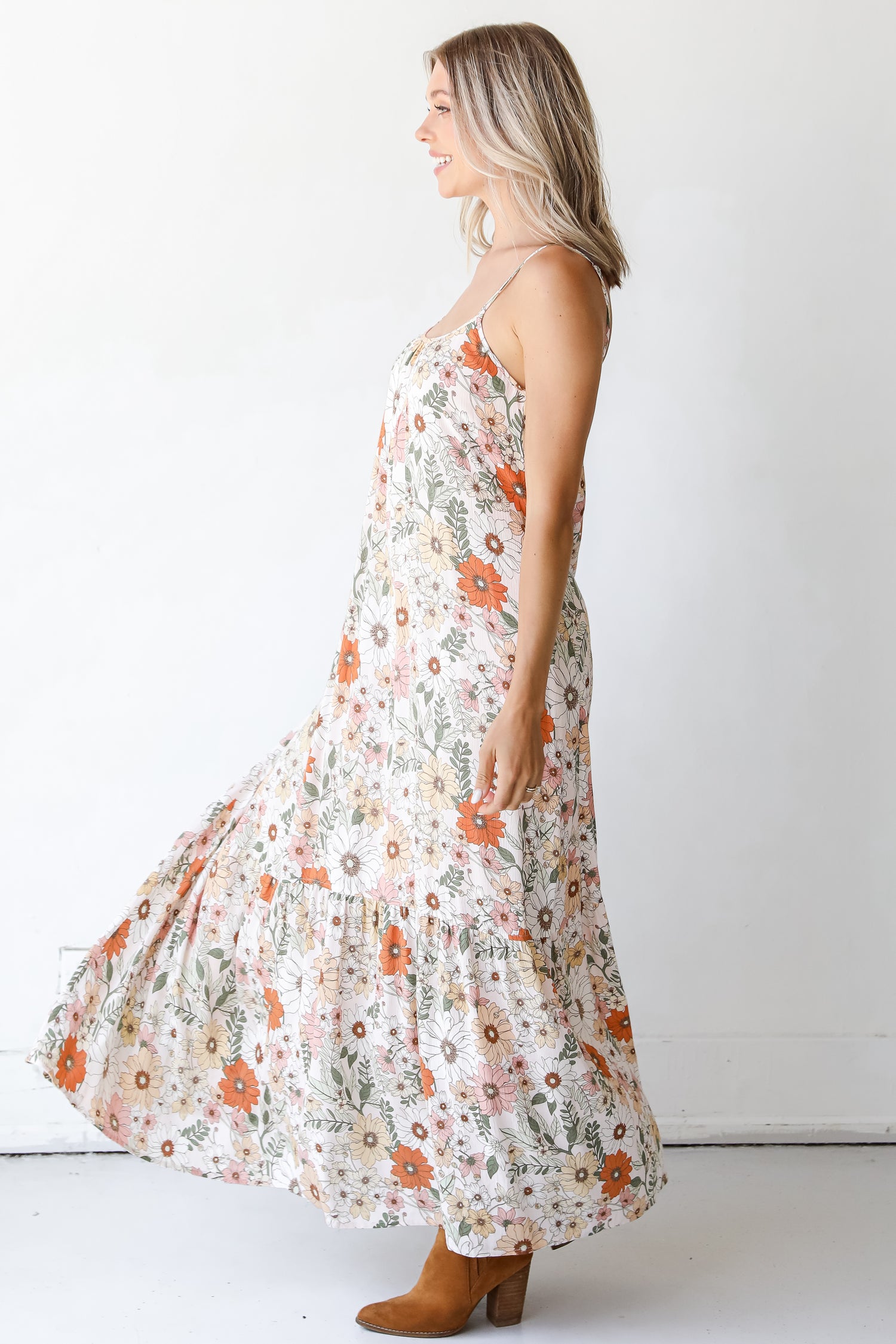 side view of an ivory Floral Maxi Dress
