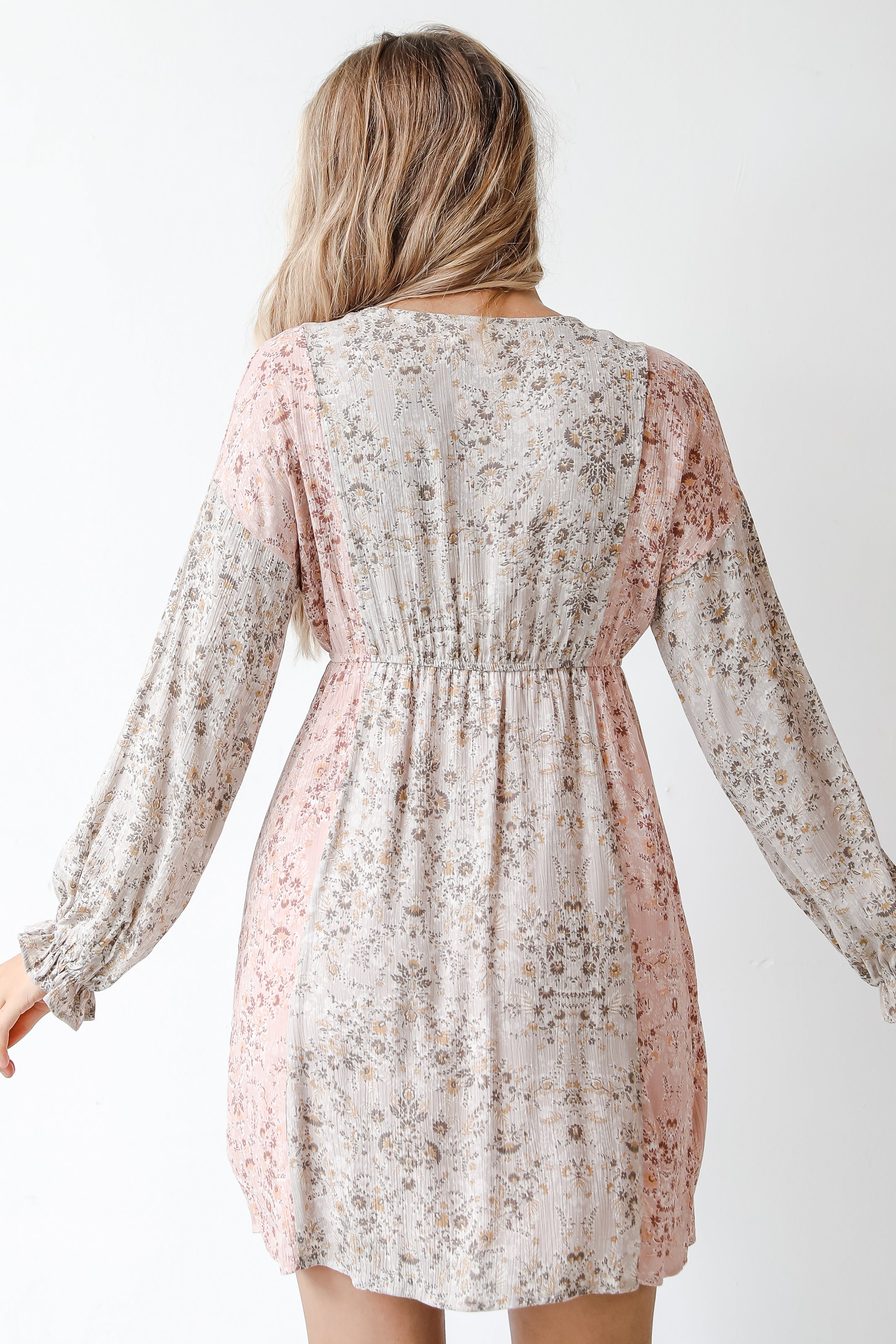 back view of a floral mini dress