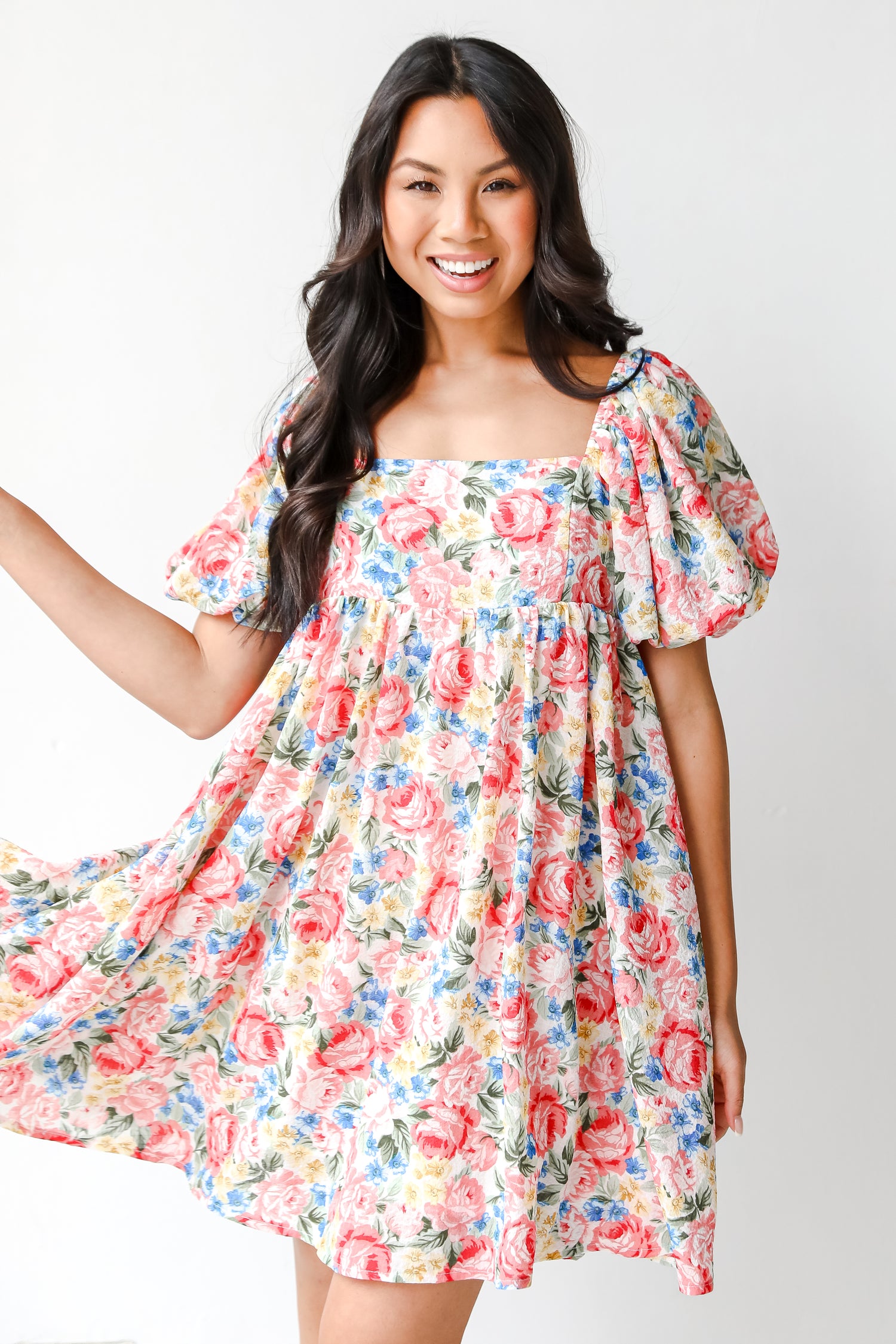 Floral Babydoll Mini Dress in pink on model