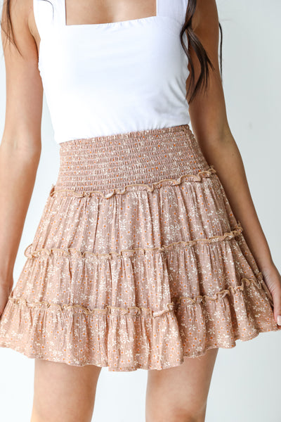 Floral Tiered Mini Skirt in blush on model