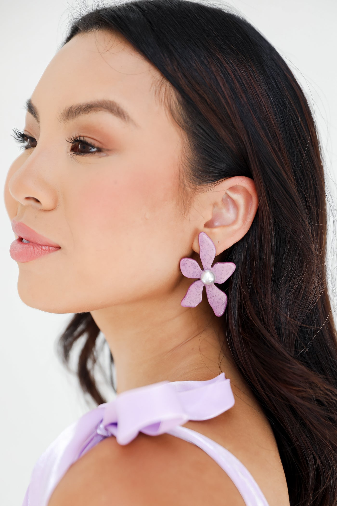 purple Flower Statement Earrings on model