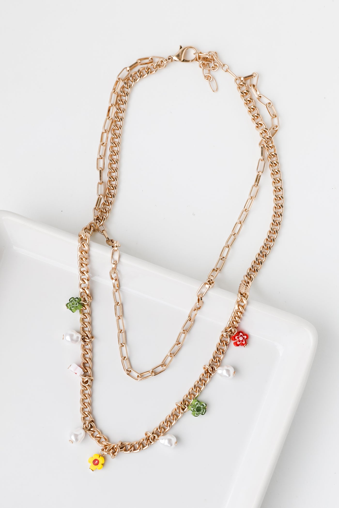 Gold Flower + Pearl Layered Necklace flat lay