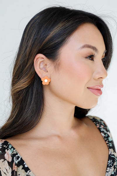 Matte Flower Stud Earrings on model