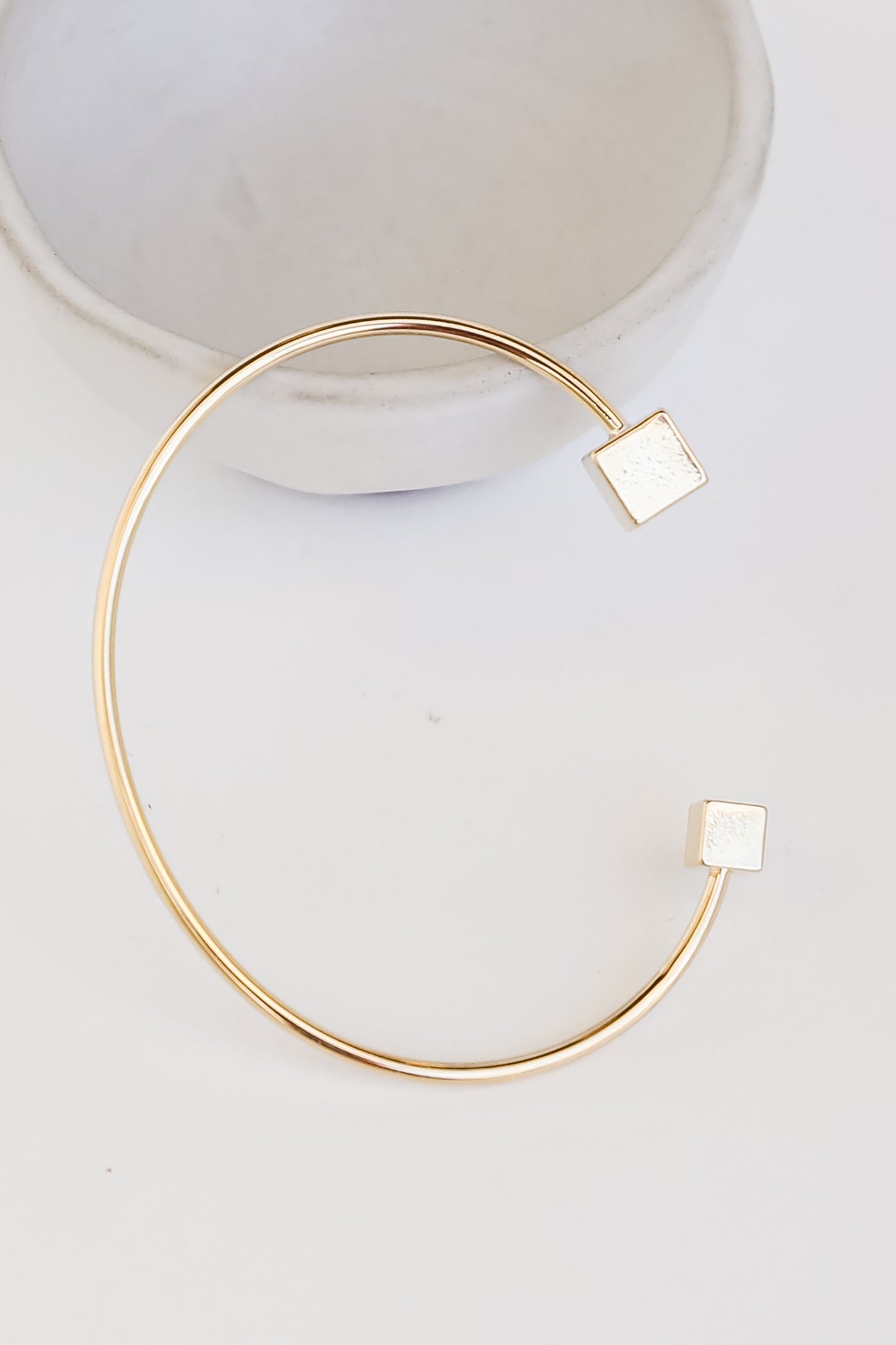 Gold Cuff Bracelet flat lay