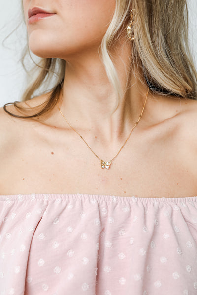 Gold Butterfly Necklace on model