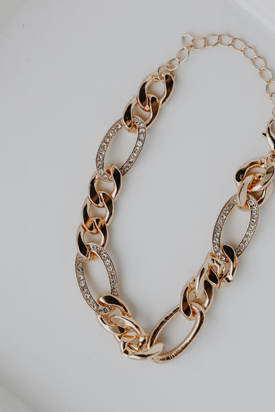 Gold Rhinestone Chain Bracelet flat lay