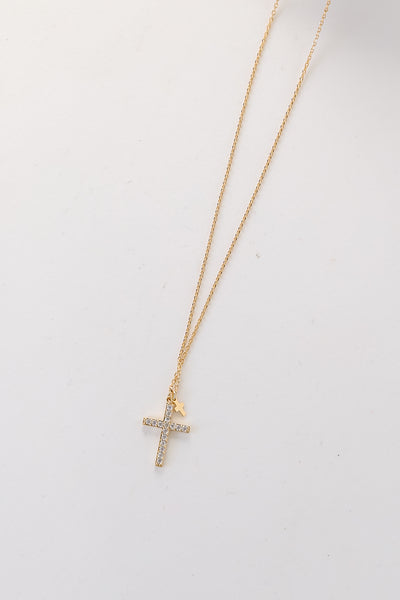 Gold Rhinestone Cross Charm Necklace flat lay
