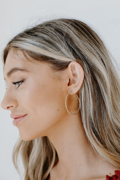 Textured Small Hoop Earrings on model in gold