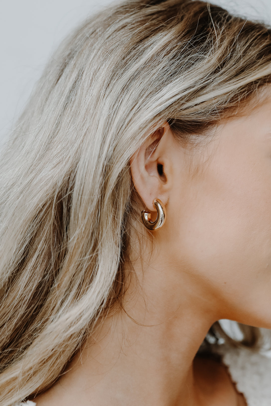 model wearing a Gold Hoop Earring Set
