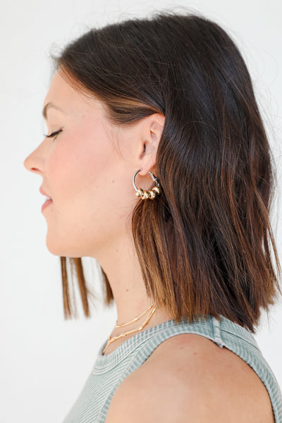 Gold Beaded Hoop Earrings on model