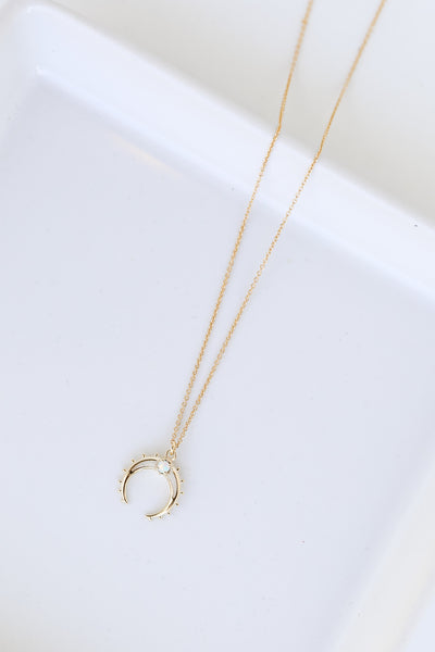 Gold Crescent Horn Necklace from dress up