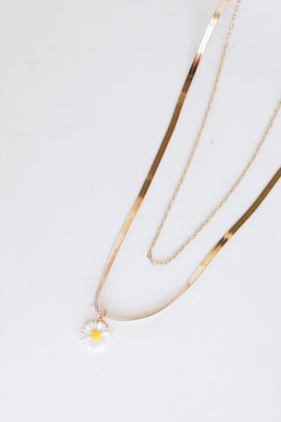 Gold Layered Daisy Charm Necklace close up
