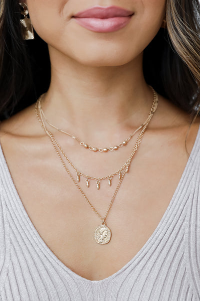 Gold Layered Coin Necklace on model