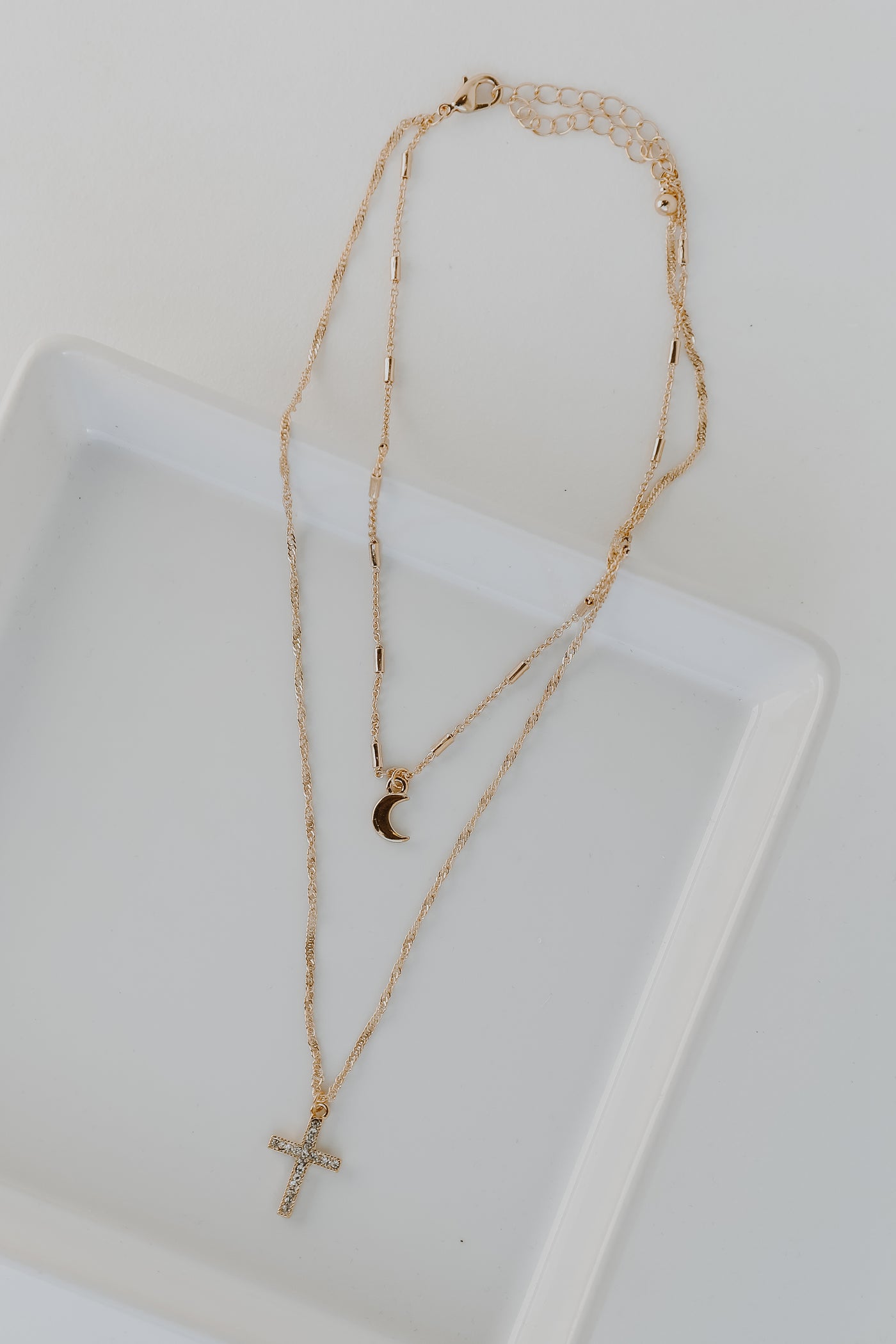 Gold Moon + Cross Layered Necklace flat lay