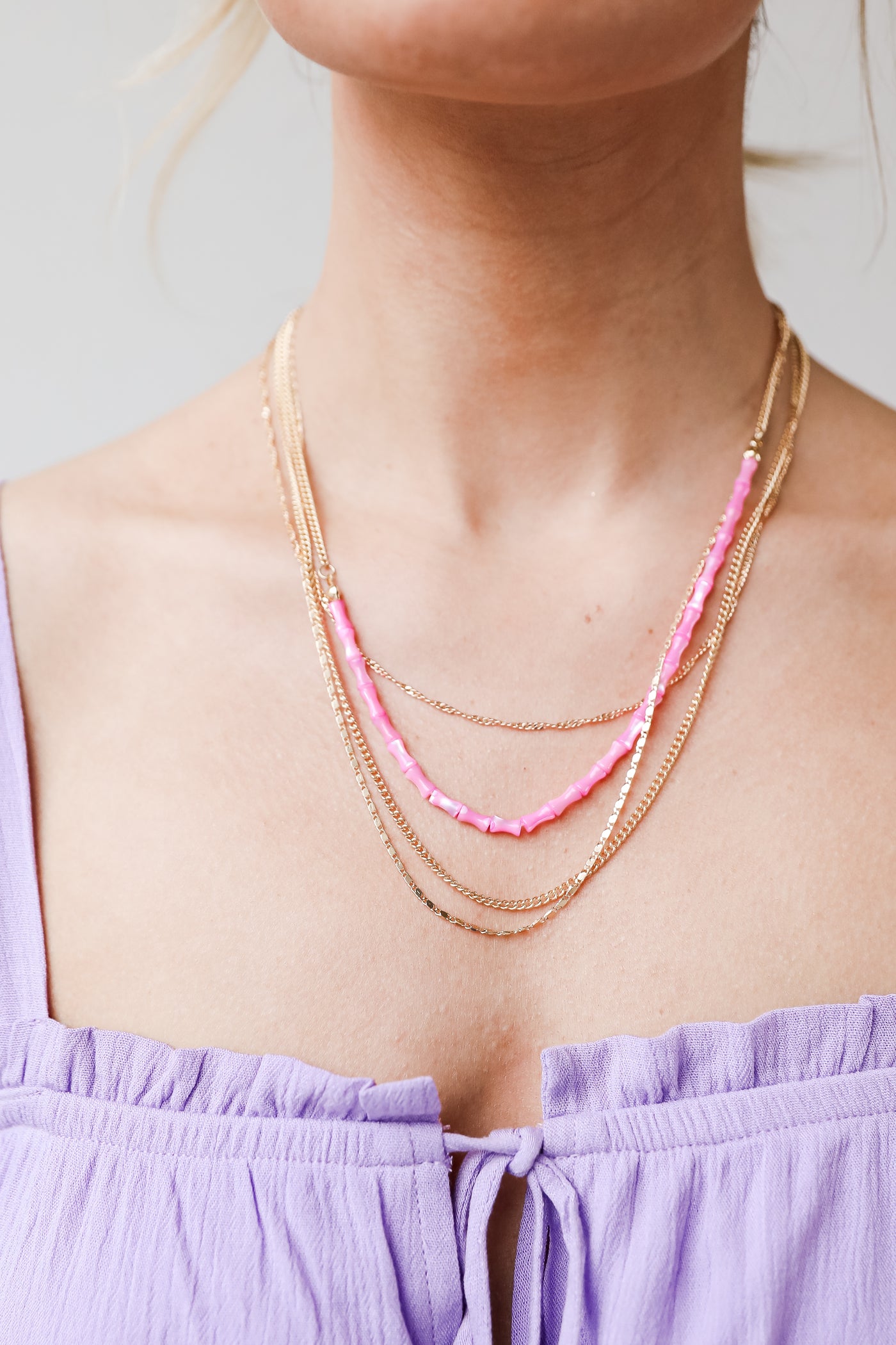 Gold Beaded Layered Chain Necklace on model