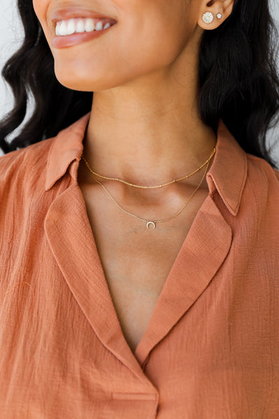Gold Crescent Horn Layered Necklace on model