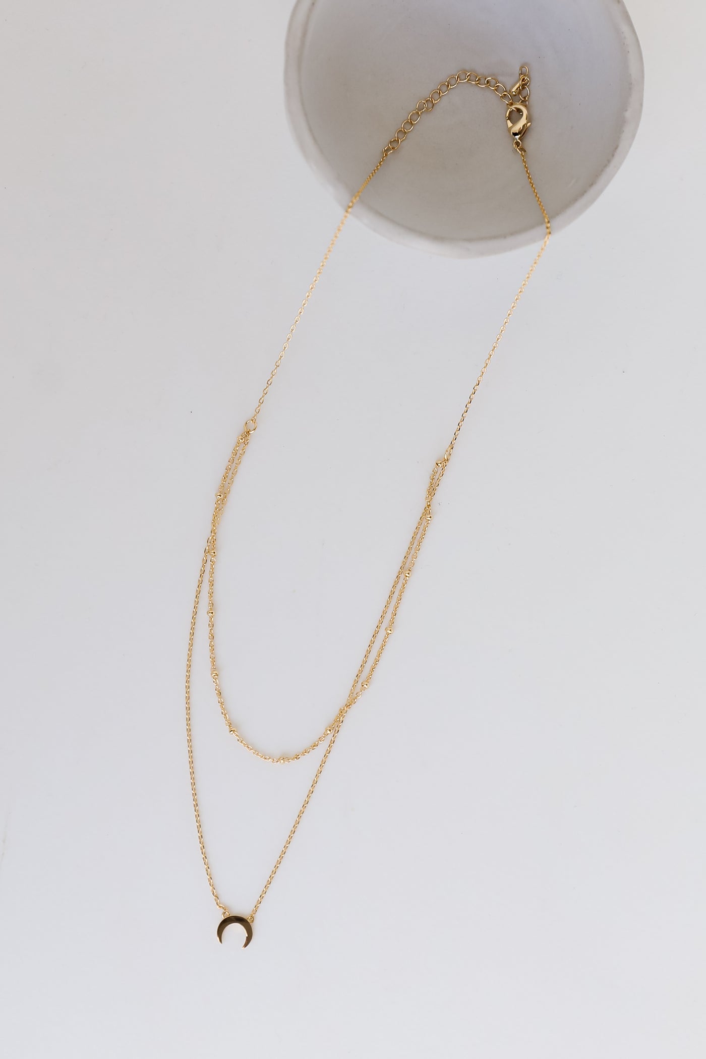 Gold Crescent Horn Layered Necklace close up