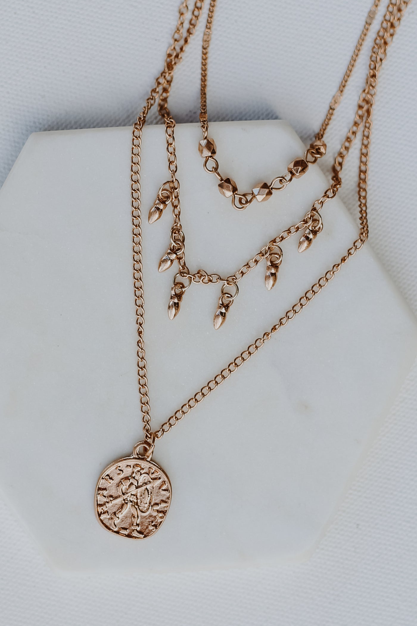 Gold Layered Coin Necklace flat lay