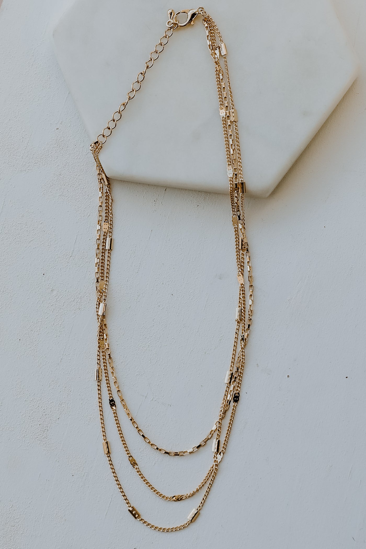 Gold Layered Necklace flat lay