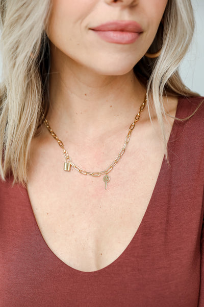 Gold Padlock + Smiley Face Key Necklace on model