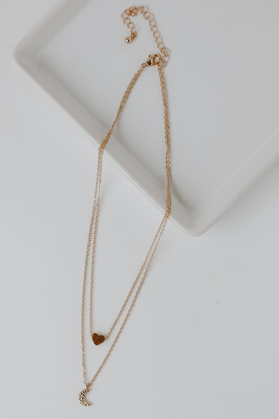 Gold Heart + Moon Layered Necklace flat lay