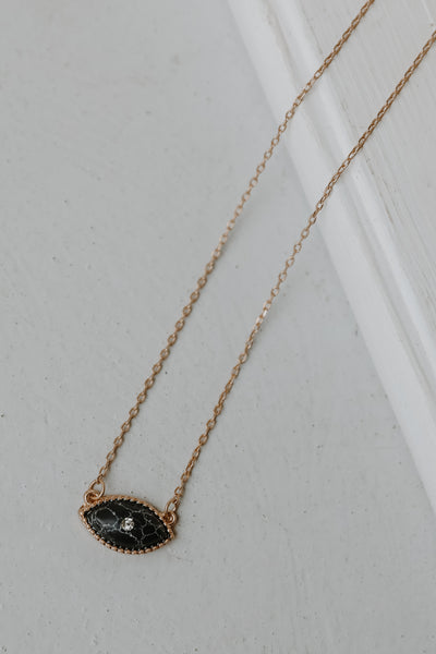 Eye Necklace in black close up