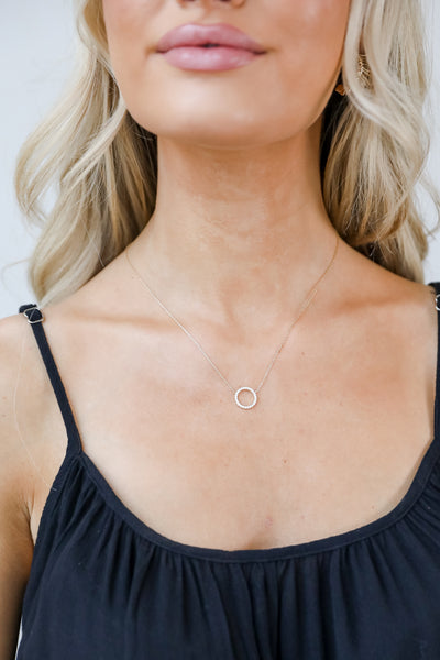Gold Rhinestone Circle Charm Necklace on model