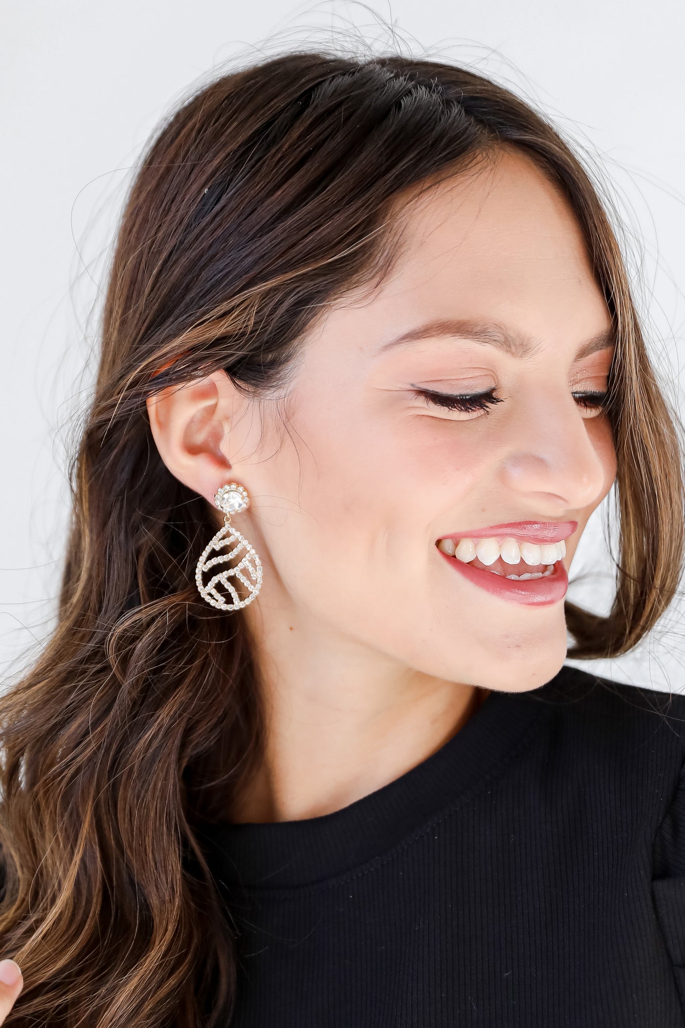 Gold Rhinestone Teardrop Earrings on model