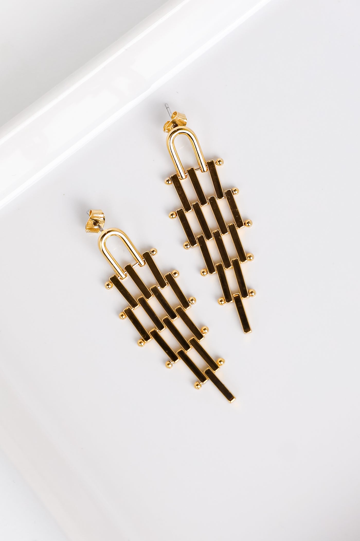 gold tiered drop earrings
