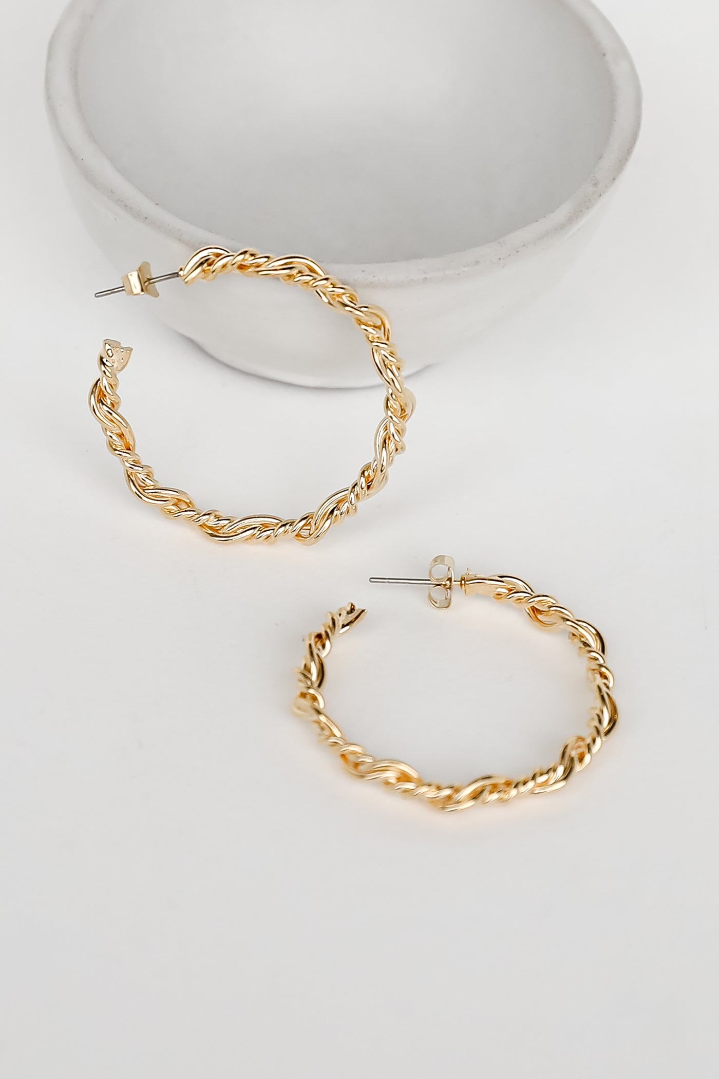 Gold Twisted Hoop Earrings close up