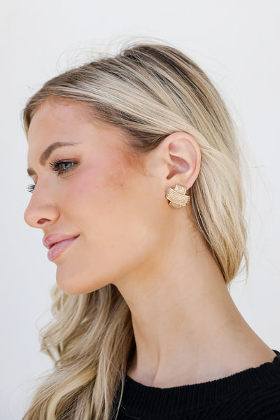 Gold Stud Earrings on model