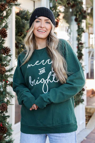 Hunter Green Merry And Bright Pullover on model