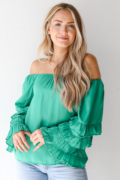 green ruffle sleeve blouse on dress up model