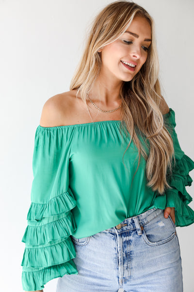 green ruffle sleeve front view