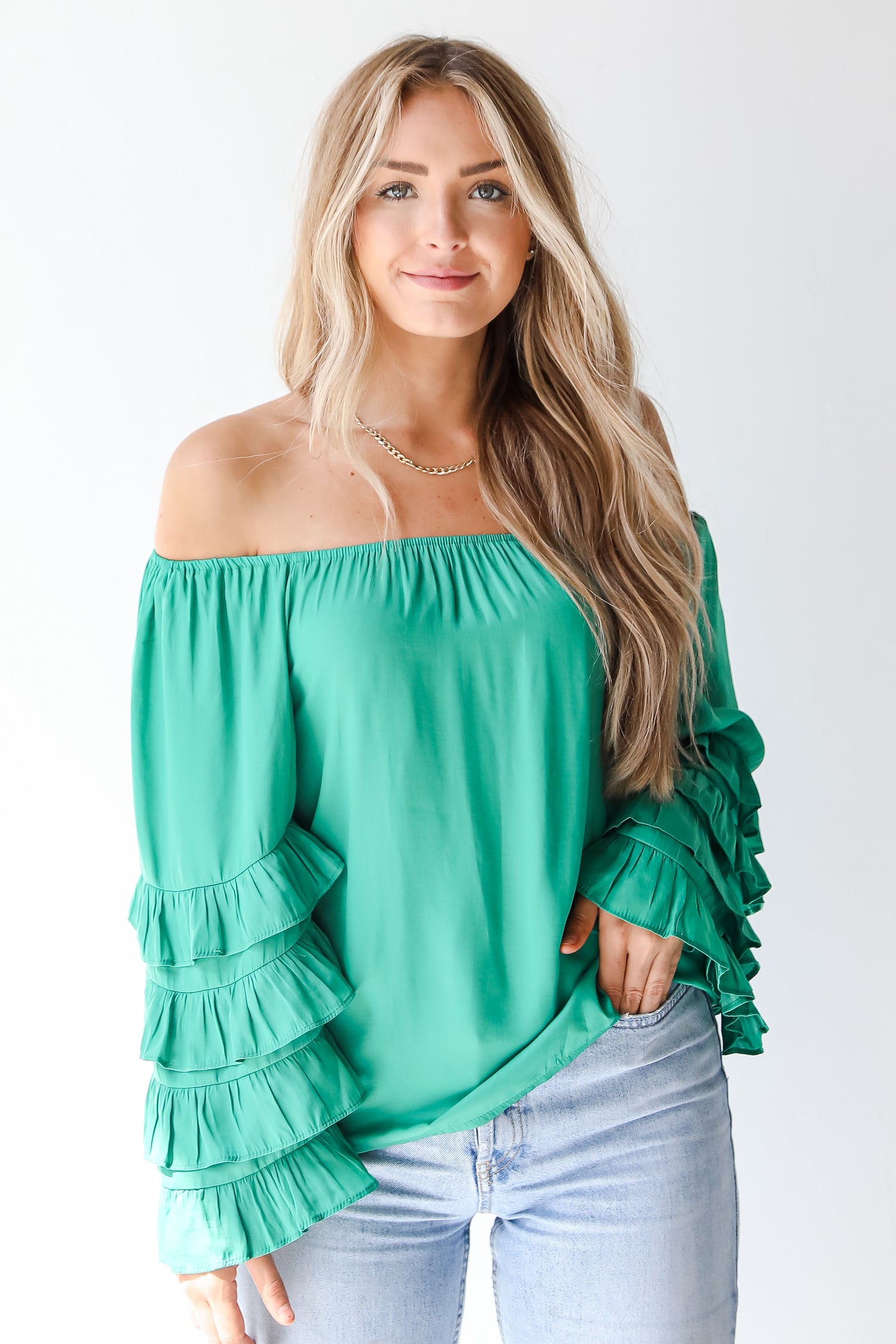 green ruffle sleeve blouse