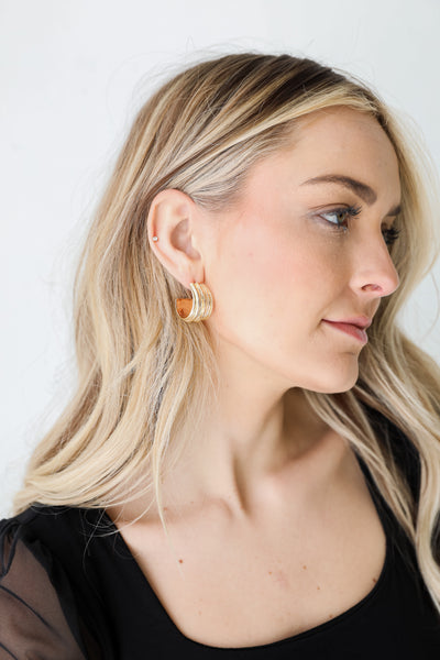 Chunky Gold Hoop Earrings on model