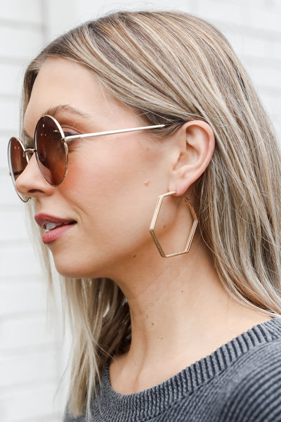 gold Geometric Hoop Earrings on model