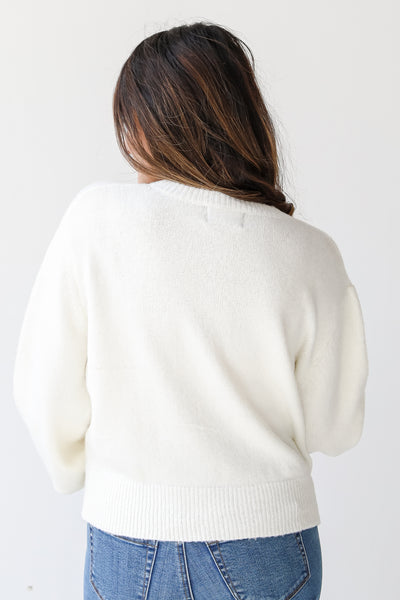 ivory sweater back view