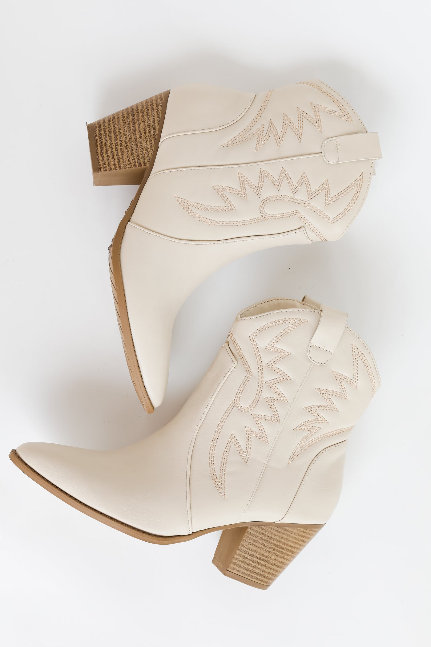 white western booties flat lay