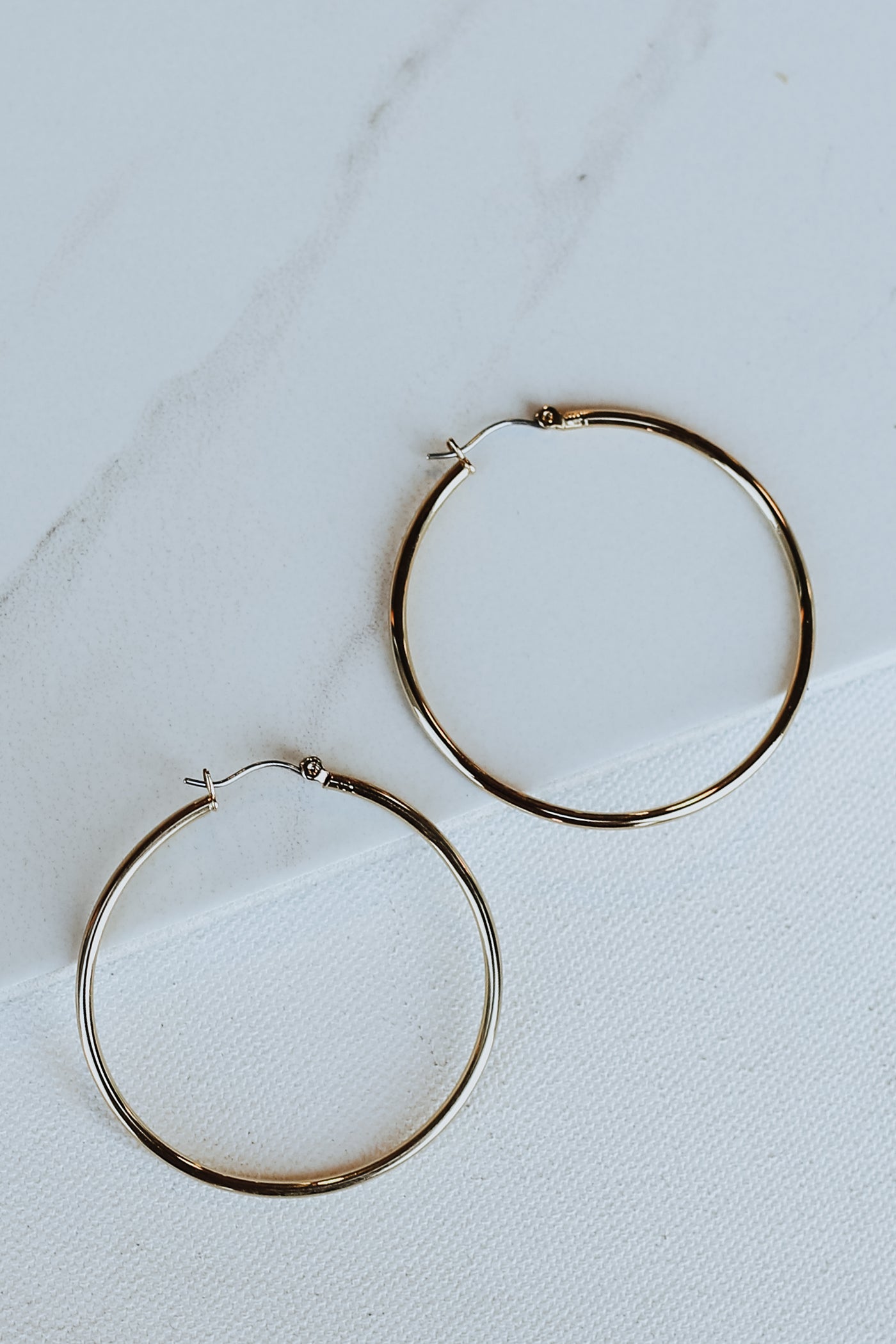Gold Small Hoop Earrings flat lay