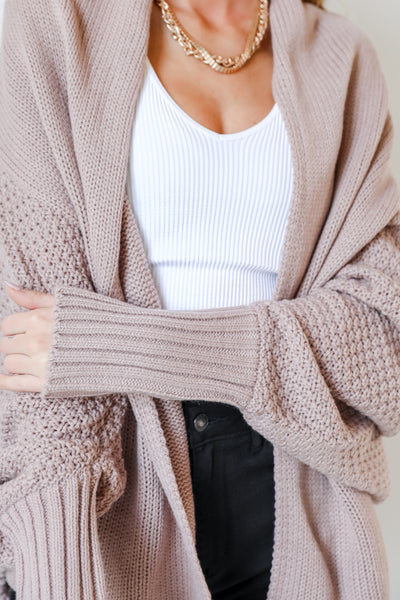 model wearing blush sweater cardigan detail view
