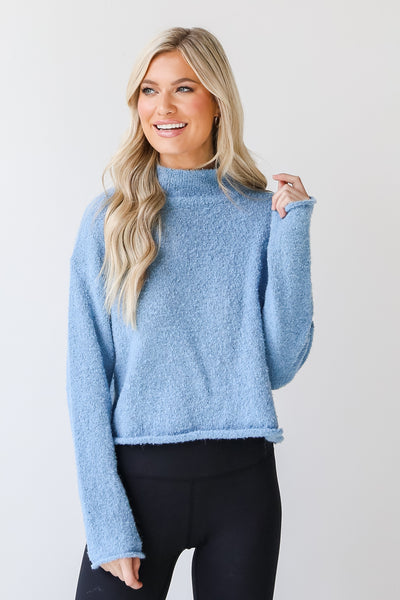 Sweater in blue front view