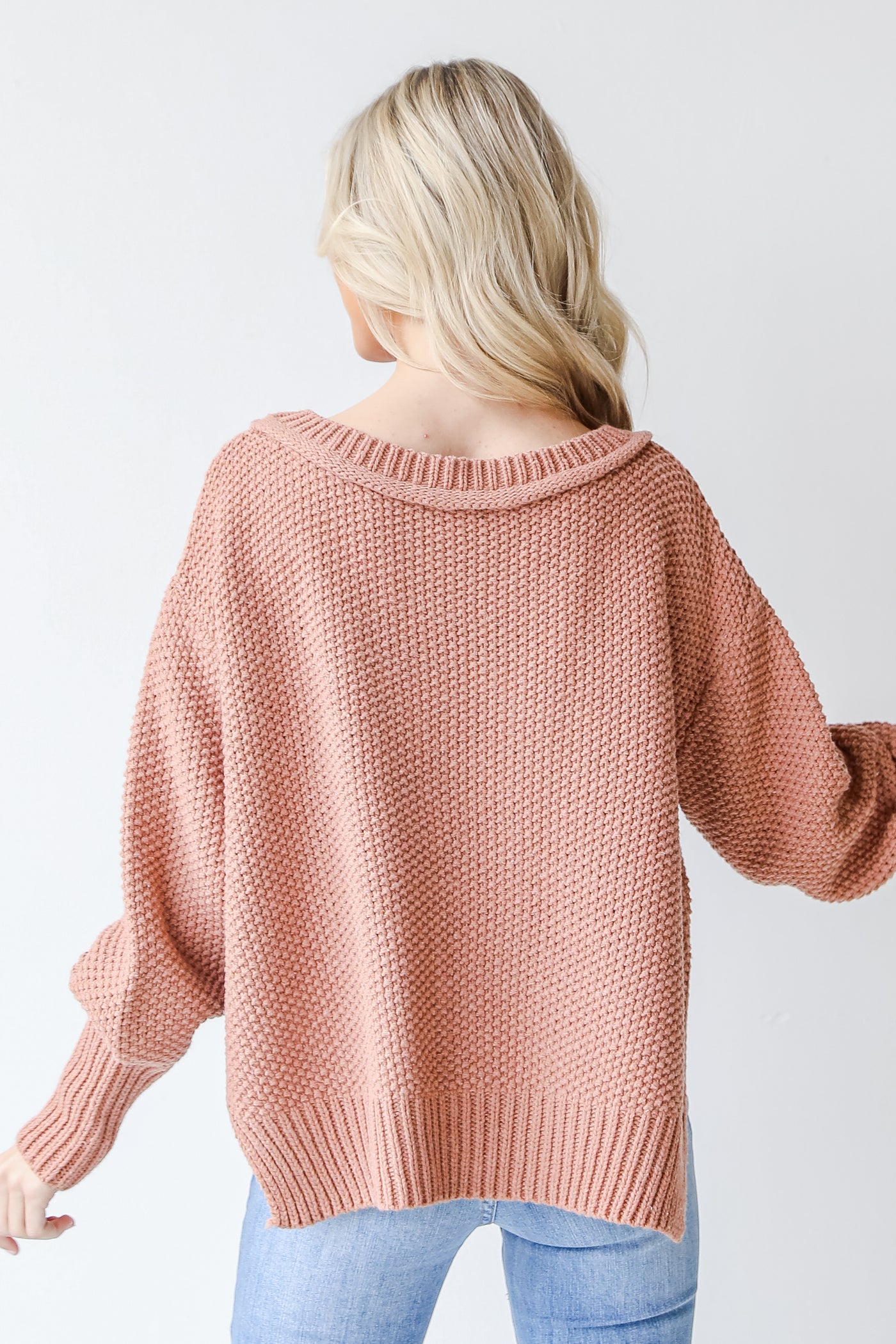Sweater in rust back view