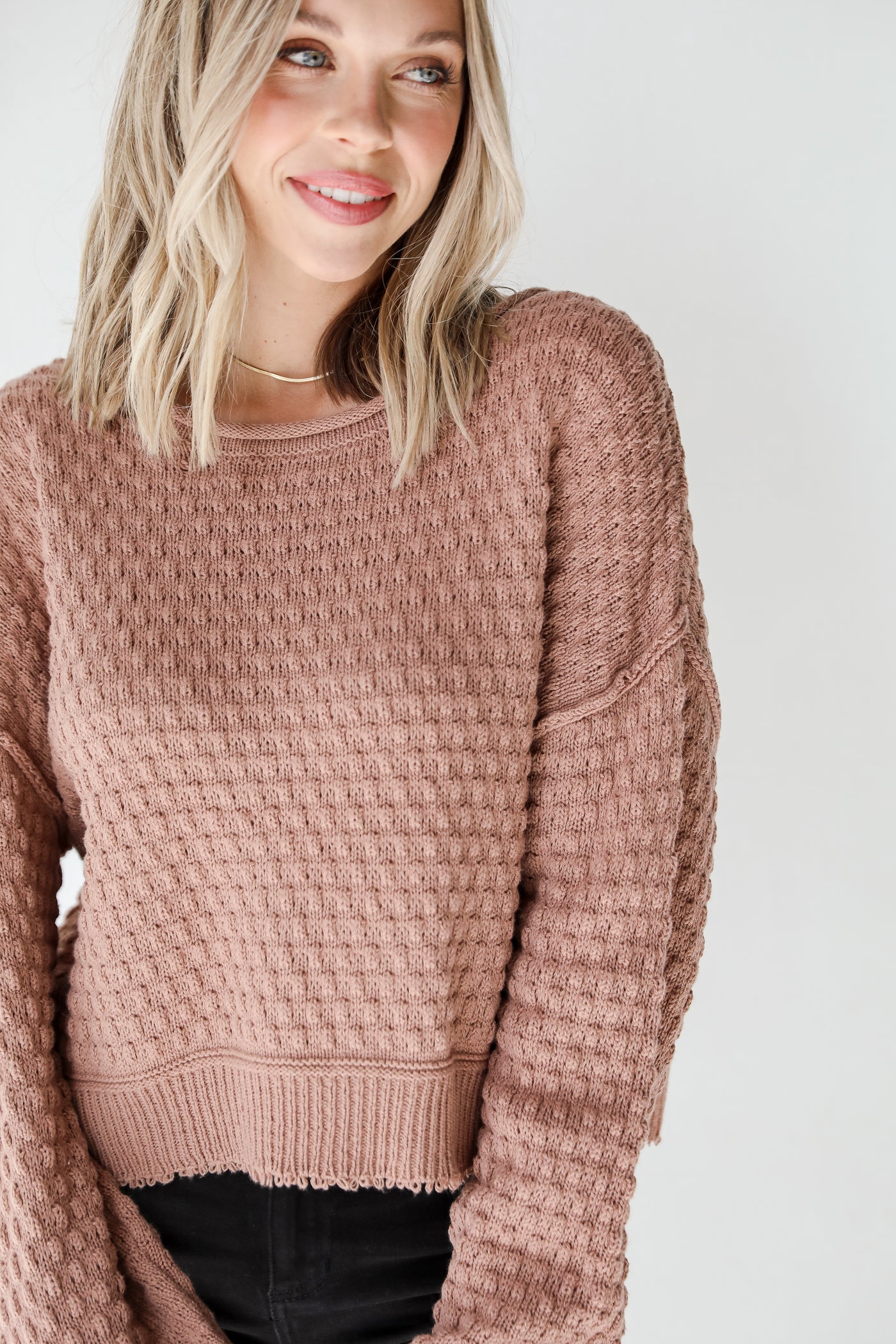 mauve sweater front view