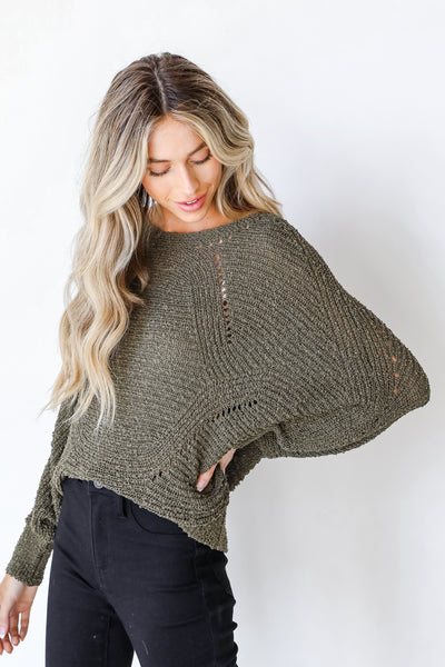 Sweater in olive side view