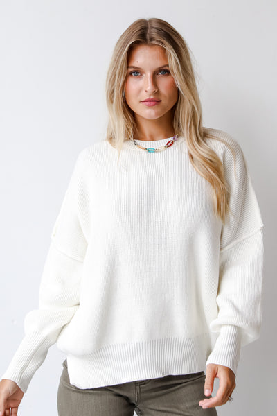 white sweater front view